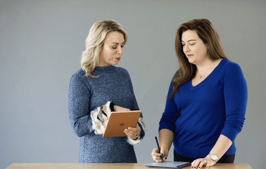Oral surgeon leading a team meeting with confidence using a structured leadership method